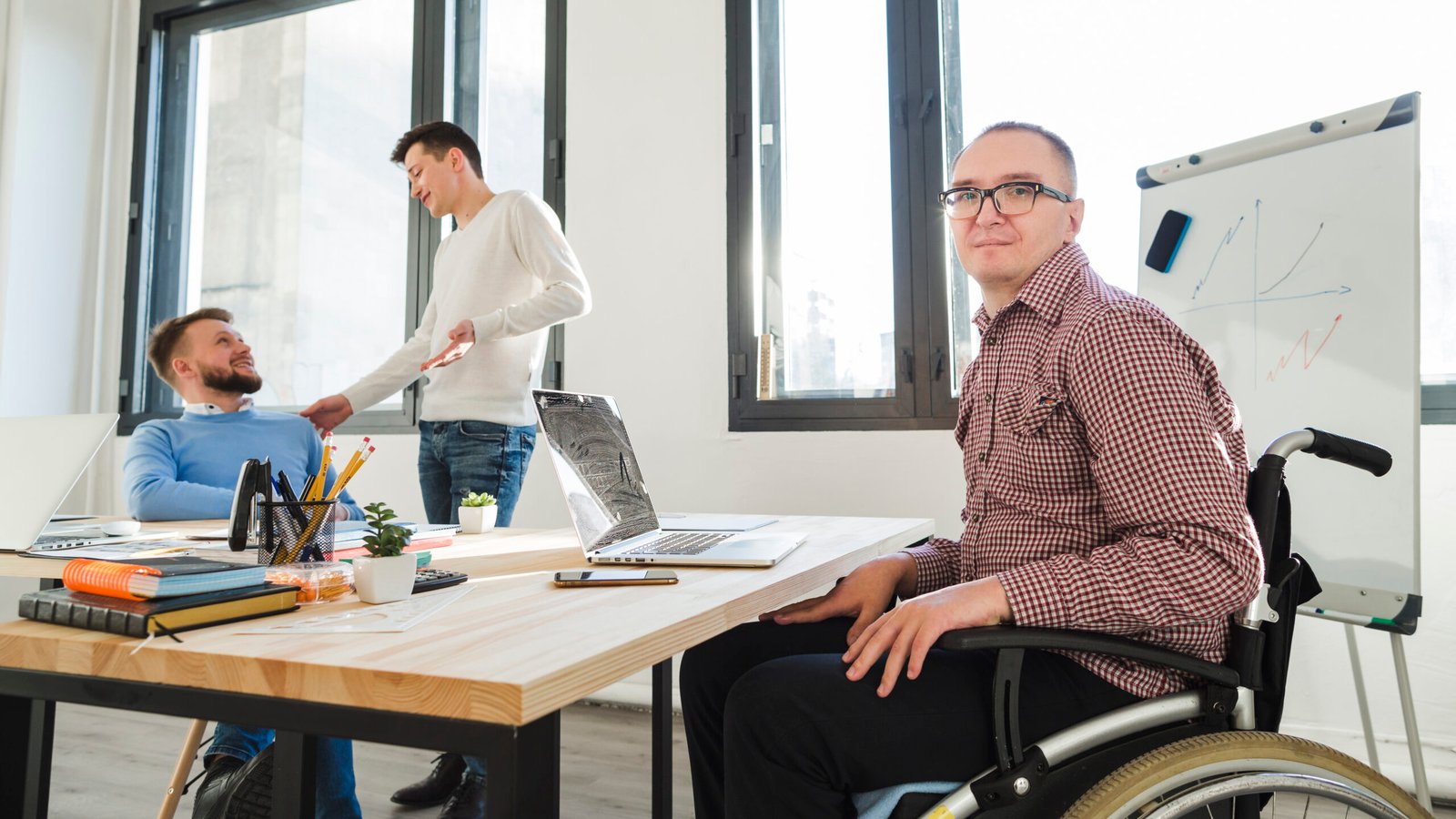 group-adult-workers-together-office