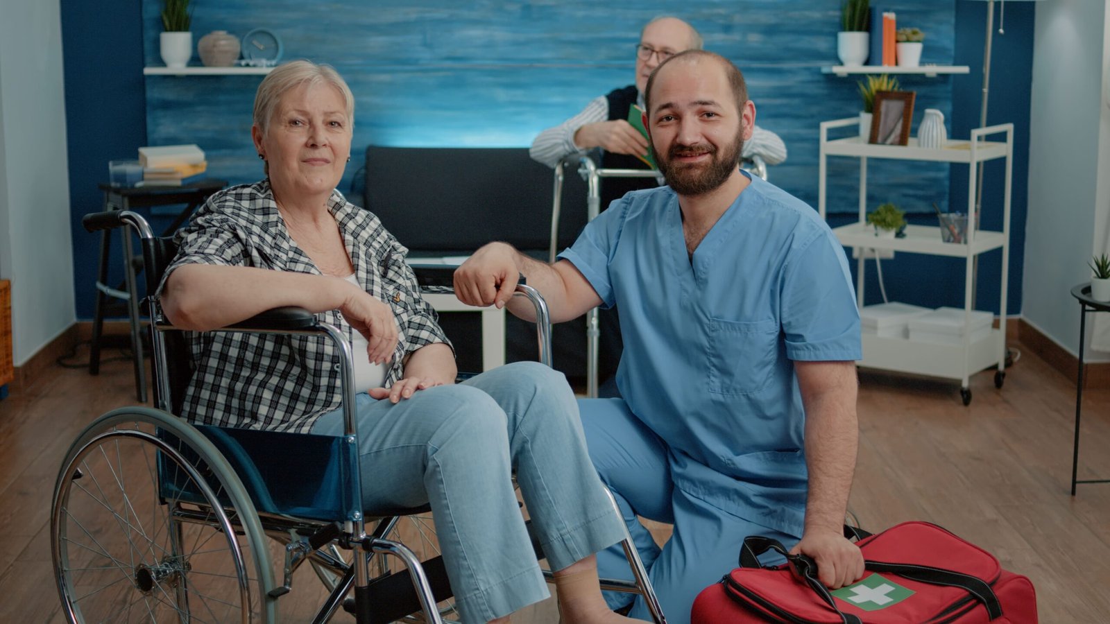 portrait-senior-woman-wheelchair-man-nurse-min